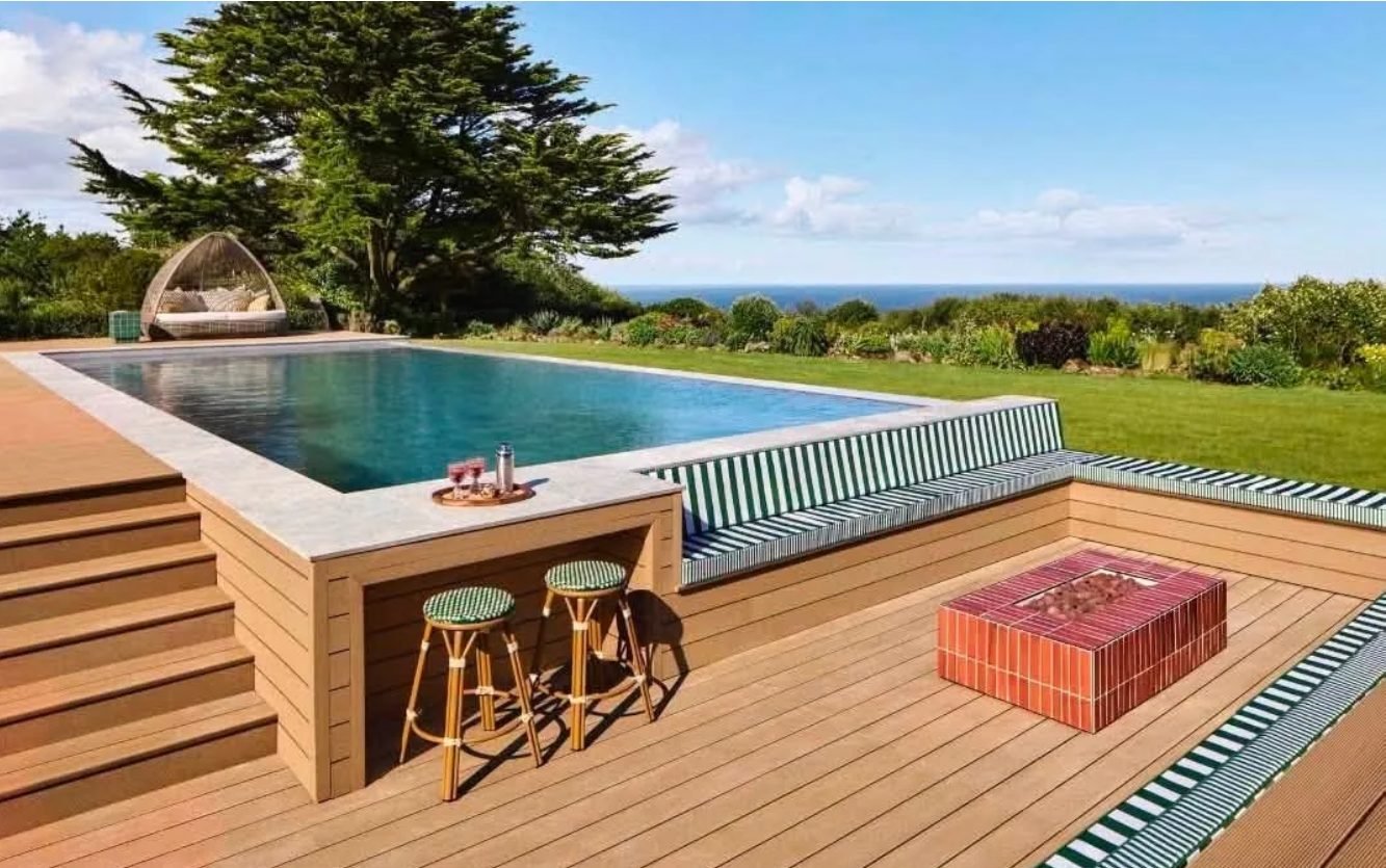 Finished pool with decking and swim-up bar