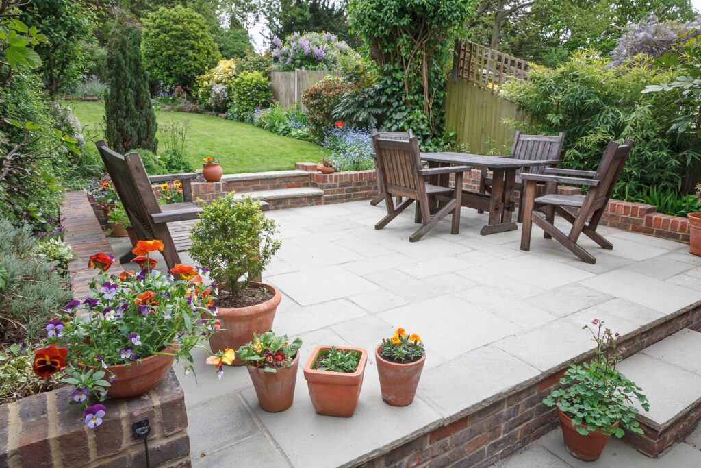 Hard Landscaping, New Luxury Stone Patio And Garden Of An Englis