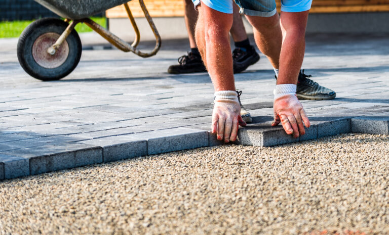Laying Gray Concrete Paving Slabs In House Courtyard Driveway Pa