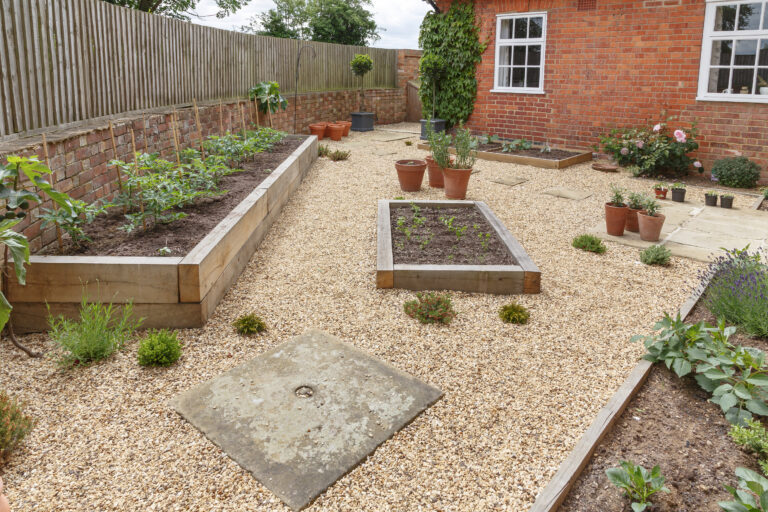 Oak Sleeper Raised Beds In A Courtyard Garden Design With Hard L