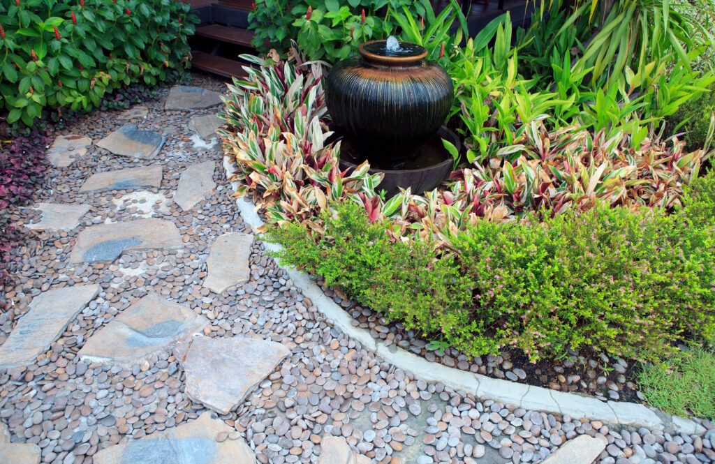 Home Garden With Fountain Jar