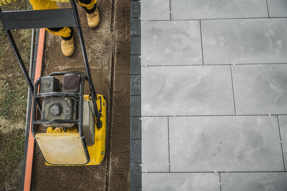 Residential,patio,brick,floor,paving,and,soil,compacting.,backyard,improvement